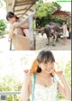 A woman in a white dress is posing next to a water buffalo.